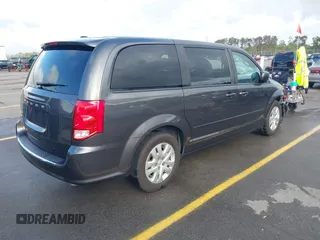 2017 Dodge Grand Caravan SE with VIN 2C4RDGBG3HR865948, listed as a IAAI auction lot 41916859 with 137,448 mi miles and . Bid and sale history available at DreamBid. Image 4.