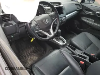 2017 Honda Fit EX-L z VIN JHMGK5H94HS012997, wystawiony jako Copart lot #82567174 z przebiegiem 64 258 mil mil oraz Czysty tytuł • Clean title. Historia ofert i sprzedaży dostępna na DreamBid. Obrazek 8.