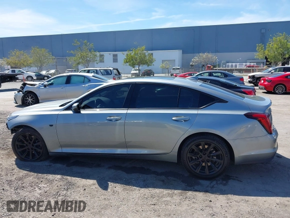 2023 Cadillac CT5 Luxury z VIN 1G6DW5RK7P0146345, wystawiony jako IAAI lot #41862152 z przebiegiem 18 902 mil mil oraz . Historia ofert i sprzedaży dostępna na DreamBid. Obrazek 15.