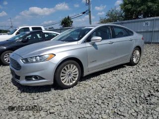 2013 Ford Fusion SE Hybrid with VIN 3FA6P0LU9DR217546, listed as a Copart auction lot 66597775 with Not provided miles and Clean title. Bid and sale history available at DreamBid. Image 1.