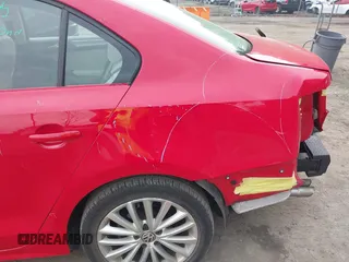 2015 Volkswagen Jetta SE z VIN 3VWD17AJ7FM204019, wystawiony jako IAAI lot #42279830 z przebiegiem 115 901 mil mil oraz . Historia ofert i sprzedaży dostępna na DreamBid. Obrazek 14.