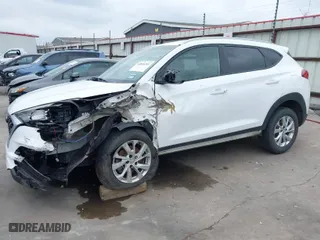 2019 Hyundai Tucson Value with VIN KM8J3CA42KU874050, listed as a IAAI auction lot 41516201 with 146,795 mi miles. Bid and sale history available at carsss.com. Image 6.