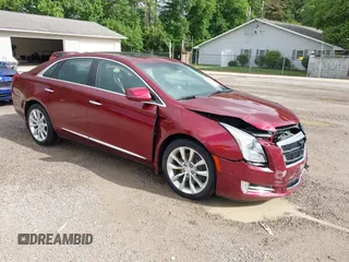 2016 Cadillac XTS Luxury Collection with VIN 2G61M5S31G9133513, listed as a IAAI auction lot 42289442 with 68,613 mi miles and . Bid and sale history available at DreamBid. Image 1.