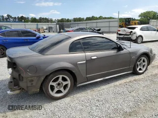 2003 Ford Mustang GT Deluxe with VIN 1FAFP42X13F392646, listed as a Copart auction lot 57938995 with 117,732 mi miles and Salvage title. Bid and sale history available at DreamBid. Image 3.