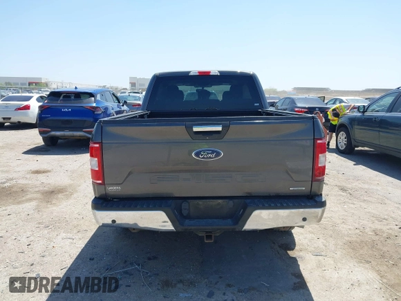 2018 Ford F-150 XL z VIN 1FTEW1CP5JKD12694, wystawiony jako IAAI lot #42002533 z przebiegiem 94 027 mil mil oraz . Historia ofert i sprzedaży dostępna na DreamBid. Obrazek 16.