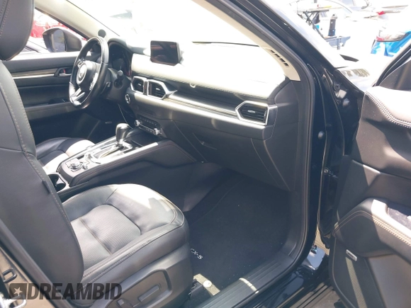 2020 Mazda CX-5 Grand Touring with VIN JM3KFADM3L1819939, listed as a IAAI auction lot 42749920 with 35,407 mi miles and . Bid and sale history available at DreamBid. Image 5.