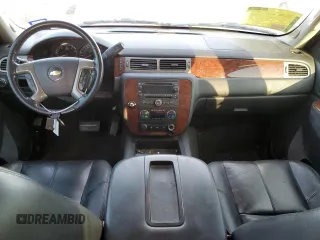 2014 Chevrolet Suburban LT with VIN 1GNSCJE03ER202873, listed as a Copart auction lot 85142854 with 213,850 mi miles and Salvage Title. Bid and sale history available at carsss.com. Image 8.