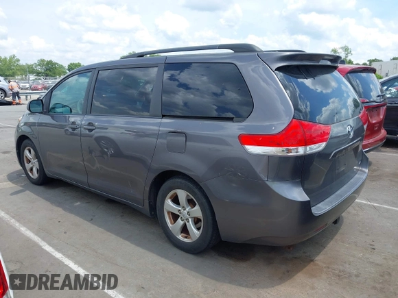 2011 Toyota Sienna LE AAS with VIN 5TDKK3DC1BS164723, listed as a IAAI auction lot 42145480 with 220,349 mi miles. Bid and sale history available at carsss.com. Image 14.