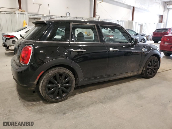 2021 MINI Hardtop 4 Door Oxford Edition with VIN WMWXU7C00M2N49230, listed as a Copart auction lot 77797914 with 51,877 mi miles and Salvage Title. Bid and sale history available at carsss.com. Image 3.
