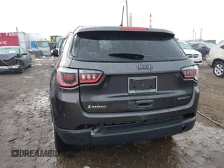 2018 Jeep Compass Sport z VIN 3C4NJCAB6JT251064, wystawiony jako IAAI lot #41457953 z przebiegiem 64 905 mil mil oraz . Historia ofert i sprzedaży dostępna na DreamBid. Obrazek 16.