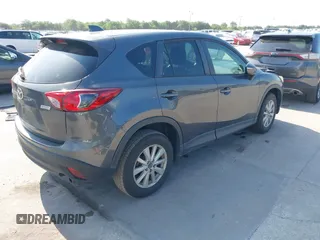2015 Mazda CX-5 Touring with VIN JM3KE2CY9F0468199, listed as a IAAI auction lot 42099253 with 110,909 mi miles and . Bid and sale history available at carsss.com. Image 4.