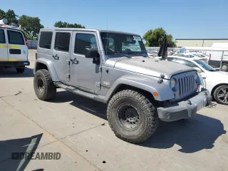 2013 Jeep Wrangler Unlimited Sahara with VIN 1C4BJWEG5DL662756, listed as a Copart auction lot 56423615 with 189,355 mi miles and Salvage title. Bid and sale history available at DreamBid. Image 4.