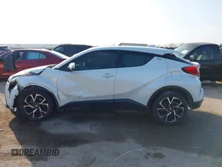 2021 Toyota C-HR LE with VIN JTNKHMBXXM1099019, listed as a IAAI auction lot 41525170 with 63,519 mi miles. Bid and sale history available at carsss.com. Image 14.