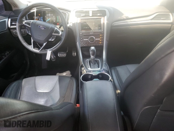 2016 Ford Fusion Titanium with VIN 3FA6P0K99GR329474, listed as a Copart auction lot 57308455 with 127,401 mi miles and Clean title. Bid and sale history available at DreamBid. Image 8.
