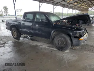 2003 Dodge Dakota Sport with VIN 1D7HL38X93S348438, listed as a Copart auction lot 73287444 with 297,185 mi miles and Salvage Title. Bid and sale history available at carsss.com. Image 4.
