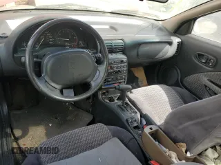 1999 Saturn SC with VIN 1G8ZY127XXZ314531, listed as a Copart auction lot 49653805 with 130,457 mi miles and Salvage Title. Bid and sale history available at carsss.com. Image 8.