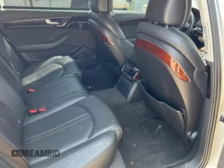 2013 Audi A8 3.0L with VIN WAURGAFD6DN010072, listed as a Copart auction lot 57999295 with 116,555 mi miles and Salvage title. Bid and sale history available at DreamBid. Image 6.