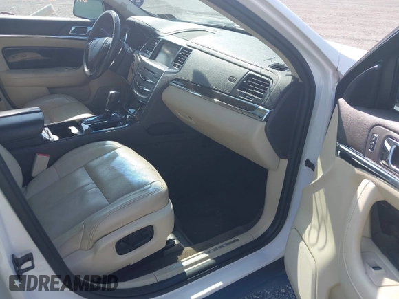 2013 Lincoln MKS EcoBoost with VIN 1LNHL9FT4DG614140, listed as a IAAI auction lot 42866991 with 126,487 mi miles and . Bid and sale history available at DreamBid. Image 5.