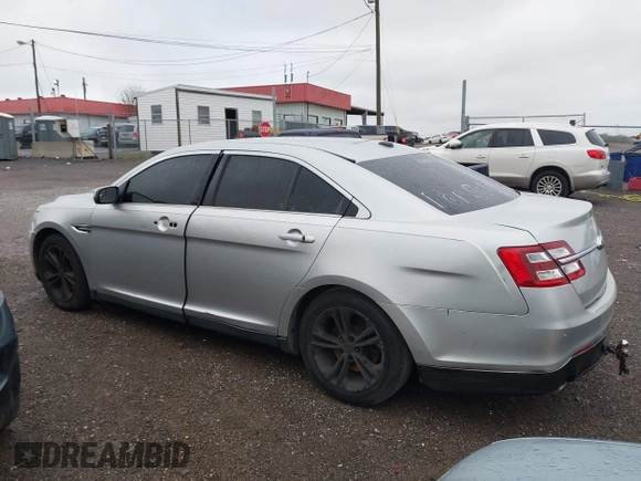 2015 Ford Taurus SEL with VIN 1FAHP2E95FG209483, listed as a IAAI auction lot 41920846 with 138,673 mi miles and . Bid and sale history available at DreamBid. Image 14.