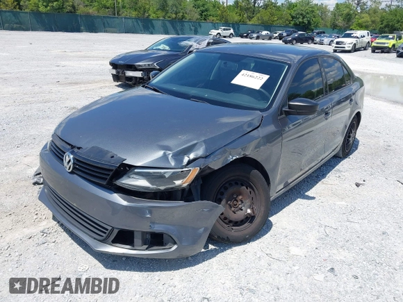 2014 Volkswagen Jetta S z VIN 3VW2K7AJ6EM253571, wystawiony jako IAAI lot #42186222 z przebiegiem 171 518 mil mil oraz . Historia ofert i sprzedaży dostępna na DreamBid. Obrazek 2.