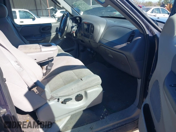 2003 Ford F-150 XL with VIN 1FTRX18L73NB36799, listed as a IAAI auction lot 41317602 with 270,075 mi miles. Bid and sale history available at carsss.com. Image 5.