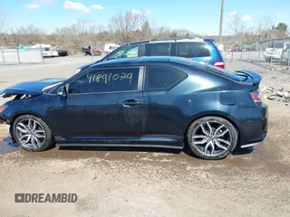 2016 Scion tC with VIN JTKJF5C71GJ020893, listed as a IAAI auction lot 41891029 with 76,341 mi miles. Bid and sale history available at carsss.com. Image 15.