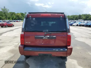 2007 Jeep Commander Sport z VIN 1J8HG48K27C527423, wystawiony jako Copart lot #63448765 z przebiegiem 212 856 mil mil oraz Szkoda całkowita • Salvage title. Historia ofert i sprzedaży dostępna na DreamBid. Obrazek 6.
