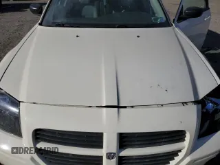 2005 Dodge Magnum SXT z VIN 2D4GZ48VX5H644848, wystawiony jako Copart lot #87614515 z przebiegiem 146 577 mil mil oraz Nie do naprawy • Non repairable. Historia ofert i sprzedaży dostępna na DreamBid. Obrazek 14.