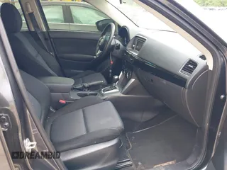 2014 Mazda CX-5 Sport z VIN JM3KE4BE6E0404753, wystawiony jako IAAI lot #42260554 z przebiegiem 144 688 mil mil oraz . Historia ofert i sprzedaży dostępna na DreamBid. Obrazek 5.