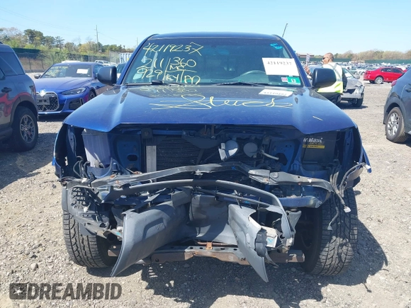 2014 Toyota Tacoma with VIN 3TMLU4EN4EM154261, listed as a IAAI auction lot 42119237 with 211,929 mi miles and . Bid and sale history available at DreamBid. Image 13.
