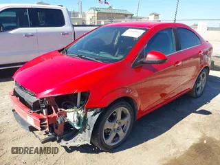 2014 Chevrolet Sonic LTZ with VIN 1G1JE5SH8E4125424, listed as a IAAI auction lot 41649065 with 161,914 mi miles. Bid and sale history available at carsss.com. Image 2.