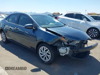2019 Toyota Corolla L z VIN 2T1BURHE9KC217993, wystawiony jako IAAI lot #41844472 z przebiegiem 126 470 mil mil oraz . Historia ofert i sprzedaży dostępna na DreamBid. Obrazek 1.