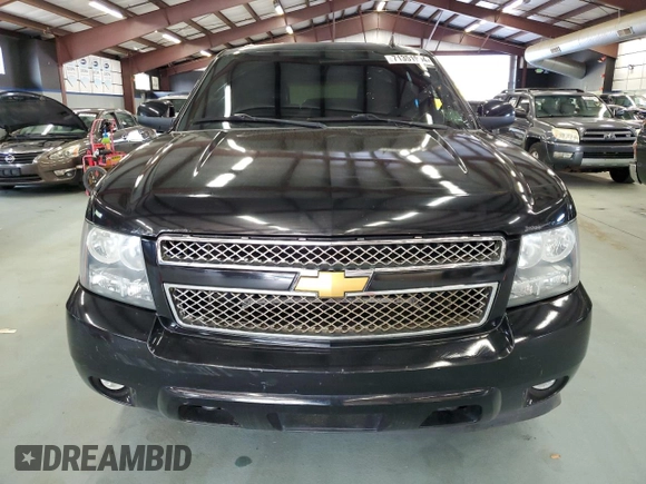 2014 Chevrolet Suburban LT with VIN 1GNSKJE77ER131290, listed as a Copart auction lot 71351994 with 258,058 mi miles and Clean Title. Bid and sale history available at carsss.com. Image 5.