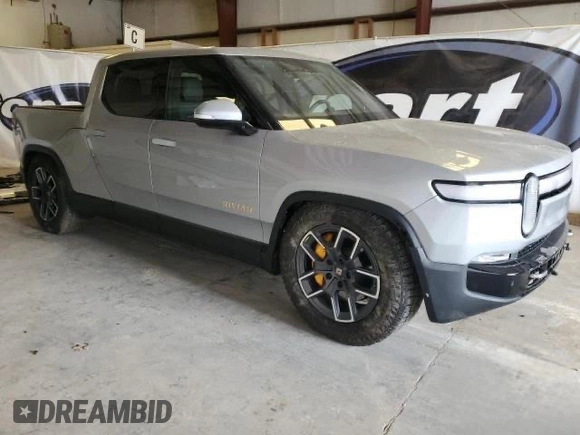 2022 Rivian R1T Launch Edition z VIN 7FCTGAAL7NN006406, wystawiony jako Copart lot #60049275 z przebiegiem 1 517 mil mil oraz Czysty tytuł • Clean title. Historia ofert i sprzedaży dostępna na DreamBid. Obrazek 1.