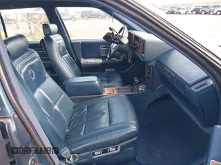 1986 Cadillac Seville z VIN 1G6KS6989GU813079, wystawiony jako IAAI lot #41732353 z przebiegiem Nie podano mil oraz . Historia ofert i sprzedaży dostępna na DreamBid. Obrazek 5.