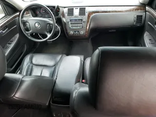 2009 Cadillac DTS Professional Limousine z VIN 1GEEK90Y89U550148, wystawiony jako Copart lot #79937134 z przebiegiem 25 996 mil mil oraz Szkody całkowita. Historia ofert i sprzedaży dostępna na DreamBid. Obrazek 8.
