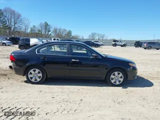 2009 Kia Optima LX with VIN KNAGE228895356661, listed as a IAAI auction lot 41821857 with 124,692 mi miles. Bid and sale history available at carsss.com. Image 14.
