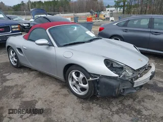 2000 Porsche Boxster z VIN WP0CA2983YU624913, wystawiony jako IAAI lot #41810897 z przebiegiem 124 393 mil mil oraz . Historia ofert i sprzedaży dostępna na DreamBid. Obrazek 1.