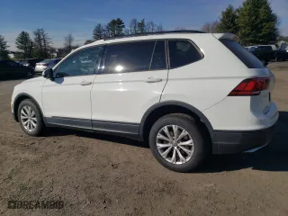 2018 Volkswagen Tiguan S with VIN 3VV1B7AXXJM079227, listed as a Copart auction lot 83267984 with 71,119 mi miles and Salvage Title. Bid and sale history available at carsss.com. Image 2.