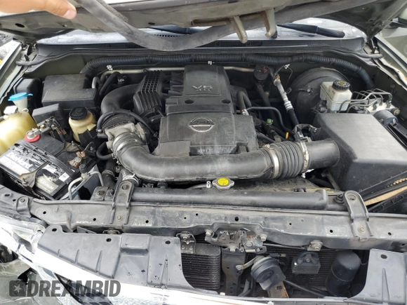 2005 Nissan Pathfinder LE z VIN 5N1AR18UX5C740258, wystawiony jako Copart lot #59152255 z przebiegiem 206 051 mil mil oraz Szkoda całkowita • Salvage title. Historia ofert i sprzedaży dostępna na DreamBid. Obrazek 12.
