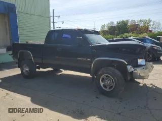 2001 Dodge 2500 with VIN 1B7KF23W21J565543, listed as a Copart auction lot 54488005 with 85,952 mi miles and Salvage Title. Bid and sale history available at carsss.com. Image 4.