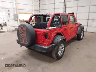 2023 Jeep Wrangler Sport S with VIN 1C4HJXDN1PW630003, listed as a IAAI auction lot 40989202 with 48,000 mi miles and . Bid and sale history available at DreamBid. Image 4.