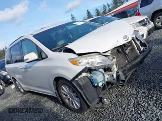 2013 Toyota Sienna XLE AAS with VIN 5TDYK3DC9DS281110, listed as a IAAI auction lot 41123061 with 148,053 mi miles and . Bid and sale history available at carsss.com. Image 1.