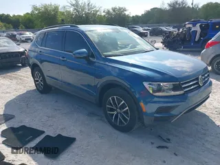 2019 Volkswagen Tiguan SE with VIN 3VV3B7AX2KM006055, listed as a IAAI auction lot 42023713 with 83,570 mi miles and . Bid and sale history available at DreamBid. Image 1.