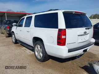 2011 Chevrolet Suburban LT with VIN 1GNSCJE00BR218380, listed as a IAAI auction lot 41628402 with 133,394 mi miles. Bid and sale history available at carsss.com. Image 3.