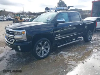 2018 Chevrolet Silverado 1500 High Country with VIN 3GCUKTEJXJG233766, listed as a IAAI auction lot 40808156 with 59,193 mi miles. Bid and sale history available at carsss.com. Image 18.