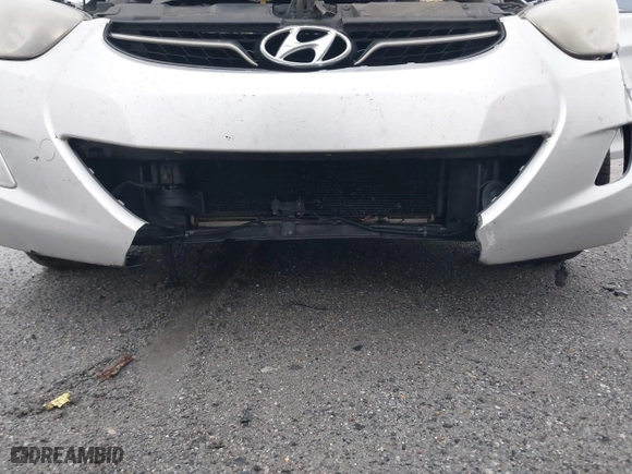2013 Hyundai Elantra GLS PZEV with VIN KMHDH4AE9DU499015, listed as a IAAI auction lot 41938352 with 243,771 mi miles. Bid and sale history available at carsss.com. Image 6.