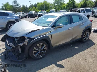 2020 Lexus UX 250h F Sport with VIN JTHR9JBH3L2036827, listed as a IAAI auction lot 42395337 with 50,096 mi miles and . Bid and sale history available at DreamBid. Image 2.