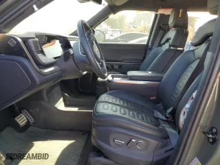 2022 Rivian R1S Launch Edition with VIN 7PDSGABL6NN000590, listed as a Copart auction lot 61510904 with 0 mi miles and Salvage Title. Bid and sale history available at carsss.com. Image 7.