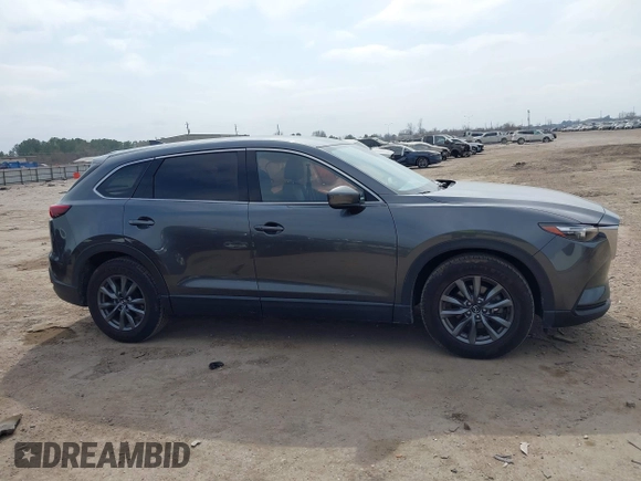 2021 Mazda CX-9 Touring with VIN JM3TCACY7M0516185, listed as a IAAI auction lot 41524084 with 53,084 mi miles. Bid and sale history available at carsss.com. Image 13.